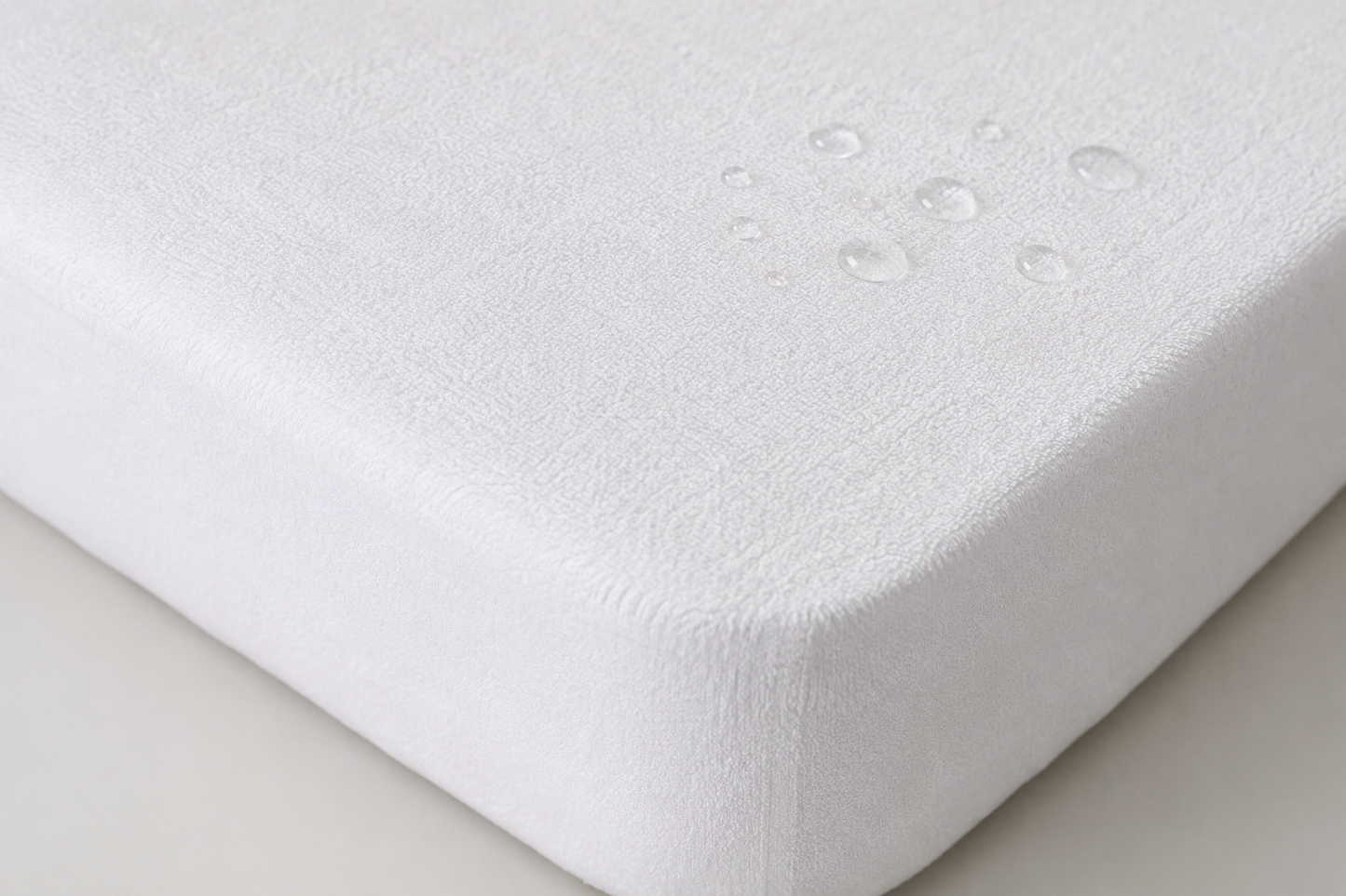 PROTECTOR RIZO ALGODÓN IMPERMEABLE CUNA 60x120