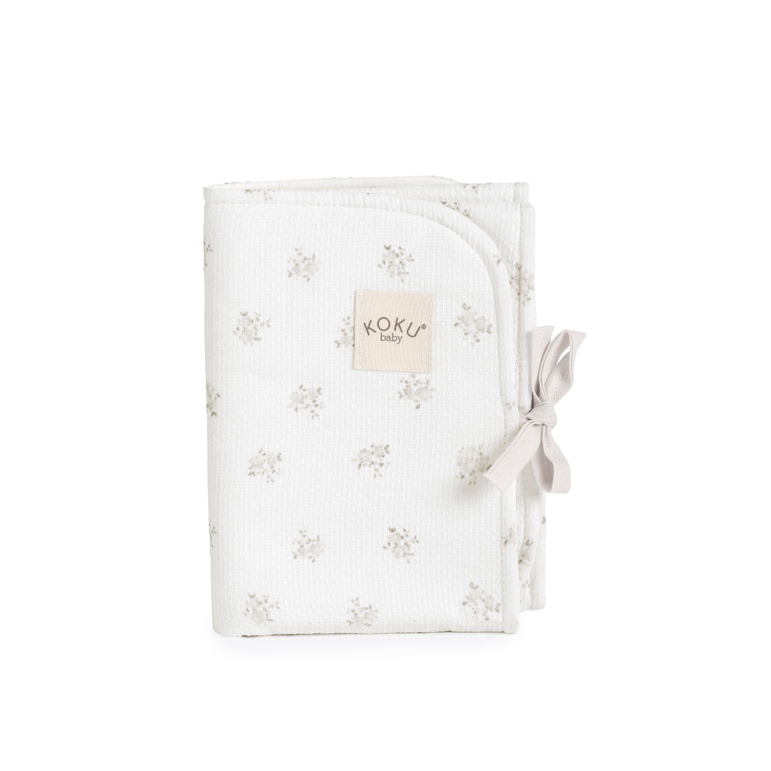 CAMBIADOR IMPERMEABLE PIQUE FLORAL